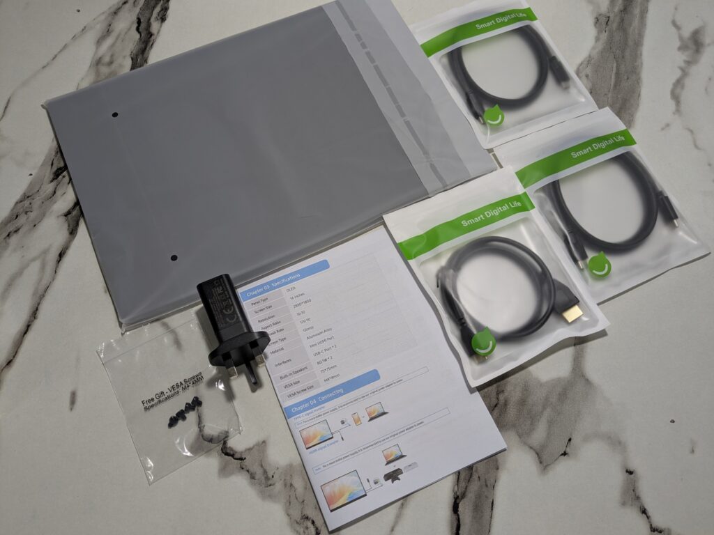 UPERFECT UColor O2 review: Amazing OLED screen in a slim design 4 UPERFECT UColor O2 OLED Portable Gaming Monitor unboxed with accessories