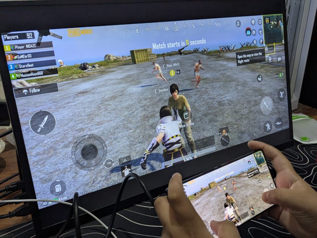 REDMAGIC 10S Pro review: The ultimate gaming beast of 2025 34 Redmagic 10S Pro gaming on portable monitor 1