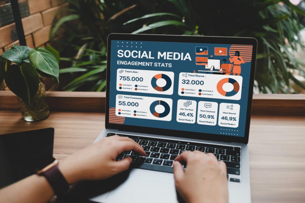 User reviewing online audience engagement statistics on laptop
