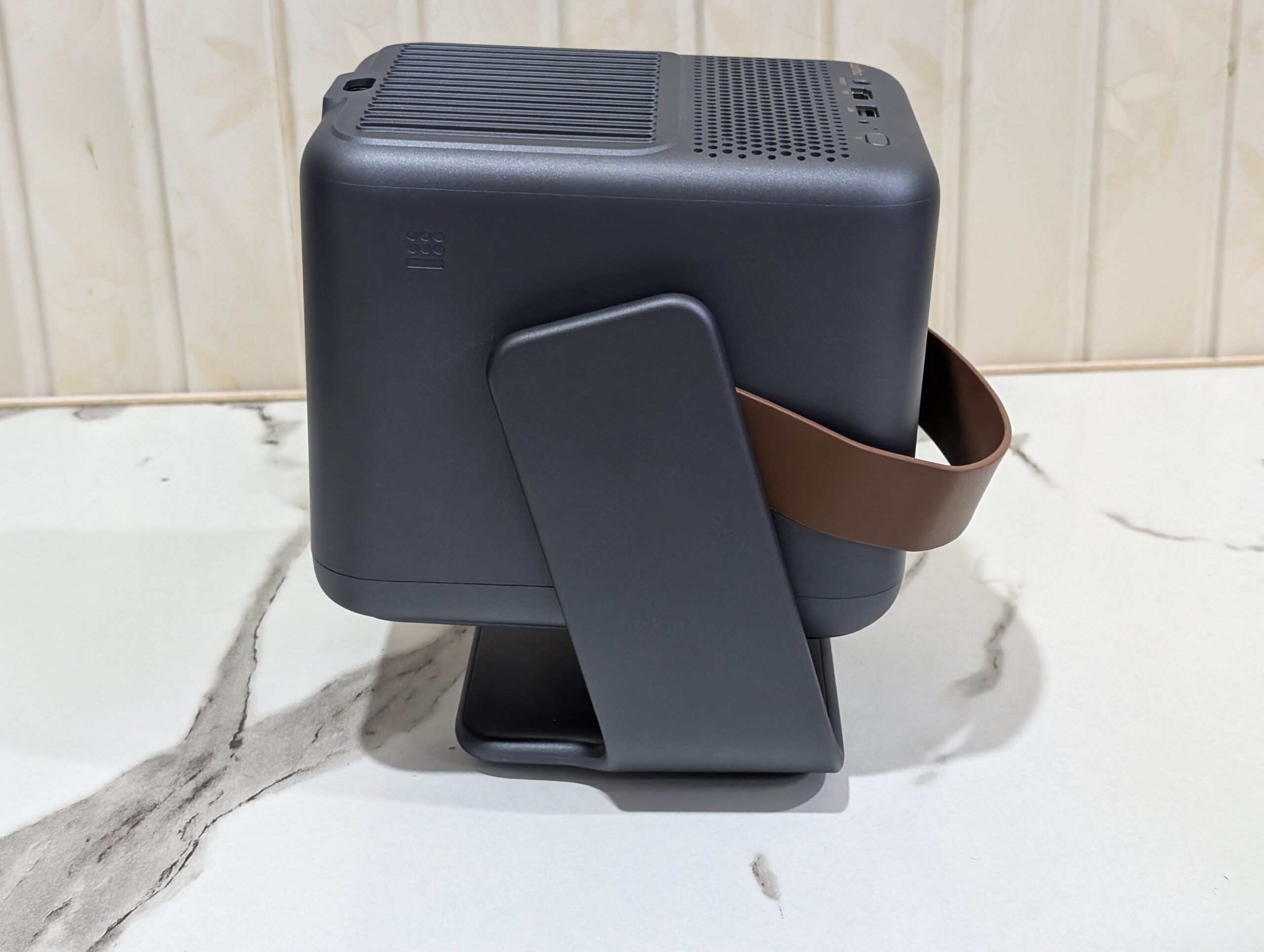 Wanbo ToGo Pro Review – A Portable Projector with a Built-In